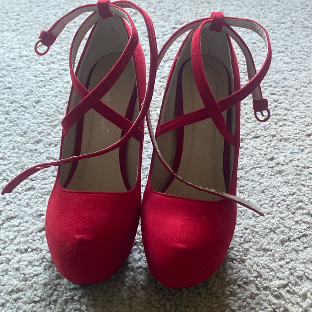 tiandikaige red heels with criss cross strap. Size 38 European size 8 US